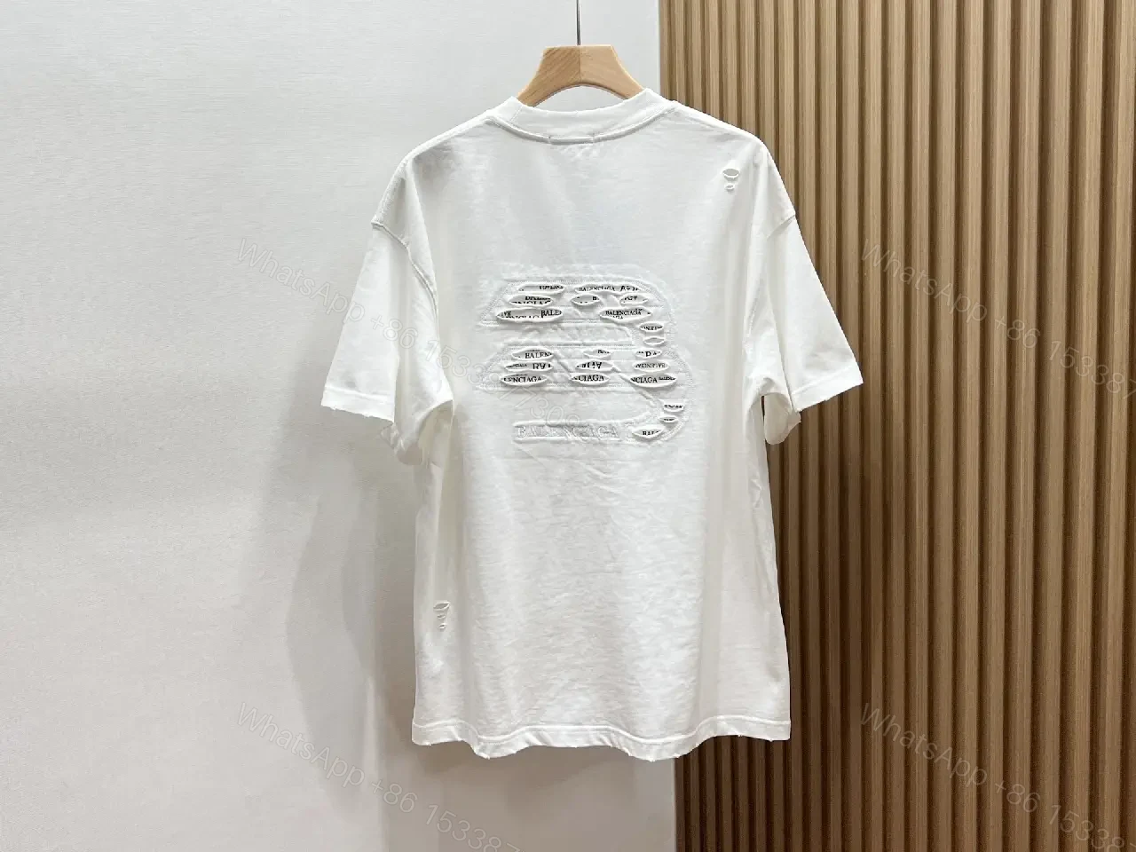 View 4 of White Cotton Minimalist Logo Tee with Subtle Hardware Details