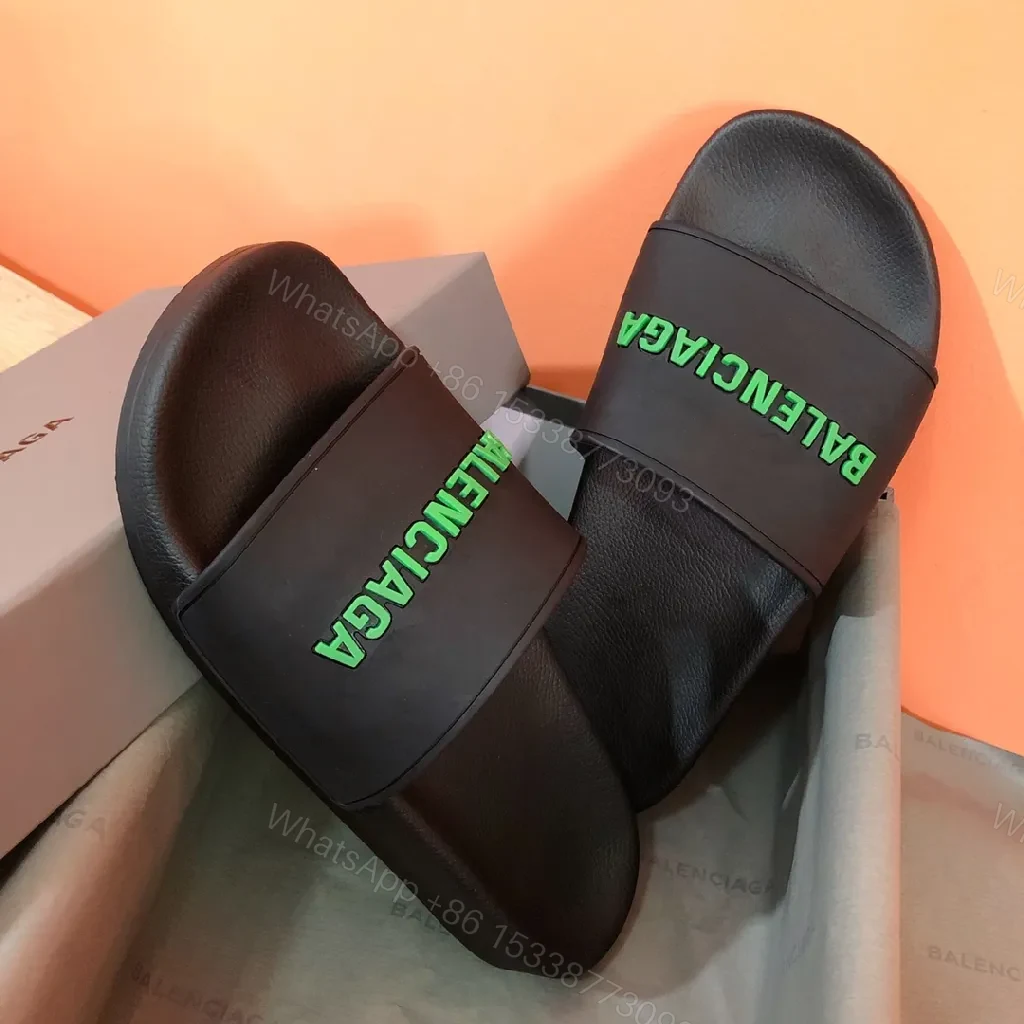 View 2 of Bold Neon Logo Slides: Black Comfort, Statement Style