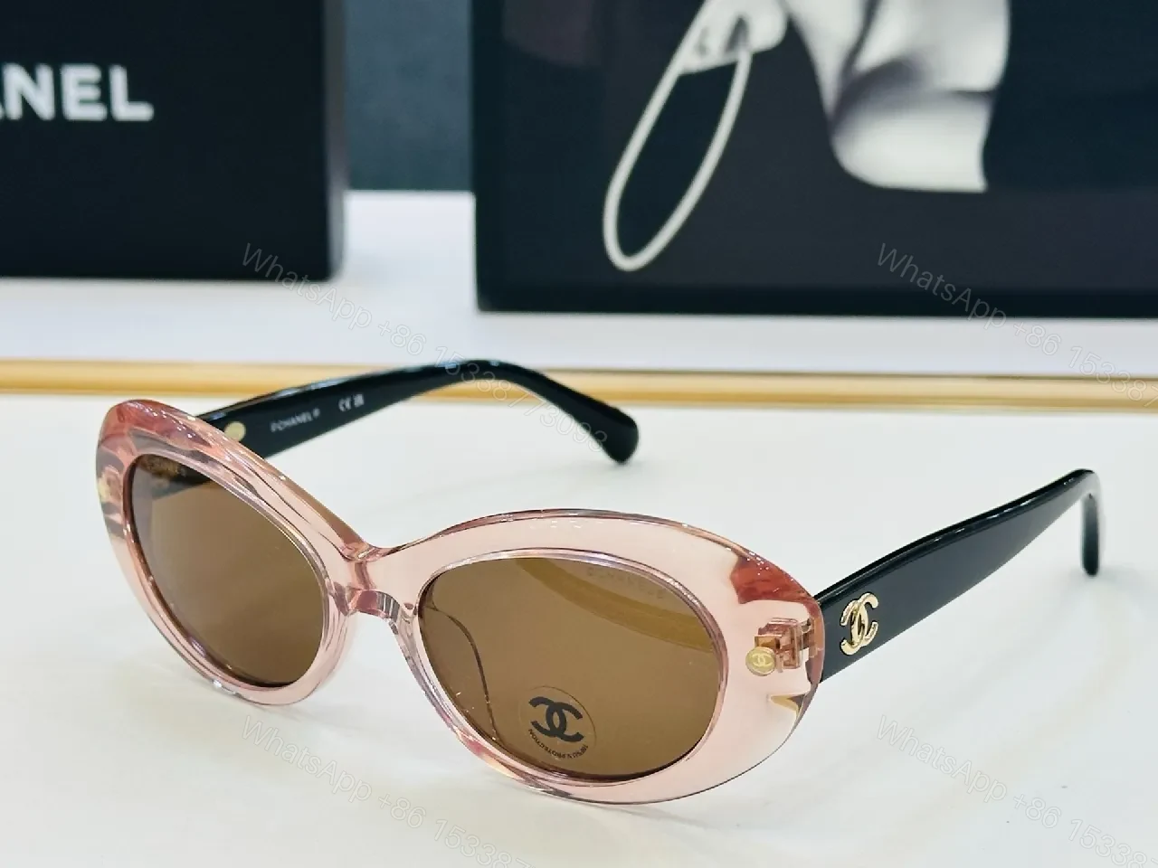 View 9 of Chic Black Cat-Eye Sunglasses with Gold Detailing