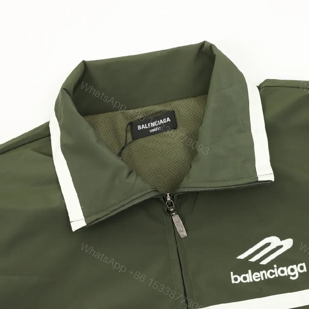 View 2 of Olive Pave Coach Jacket: Subtle Stride, Bold Presence