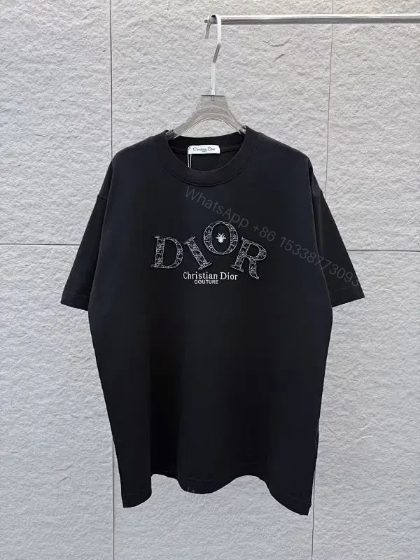 Bold Luxe Monogram Tee: Black, Oversized Fit, Graphic Statement — view 1