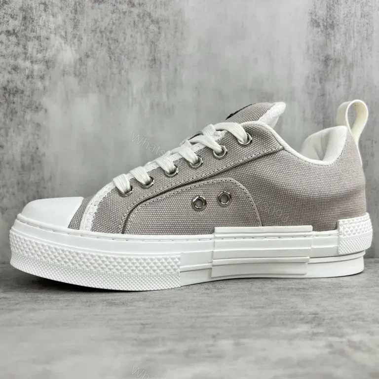 View 4 of Chic Textured Leather-Trim Sneaker with Subtle Branding