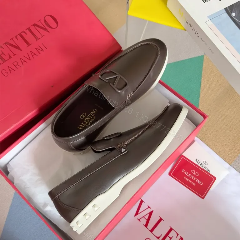 View 3 of Sleek Leather Loafers with Signature Hardware, Black, Luxury Style