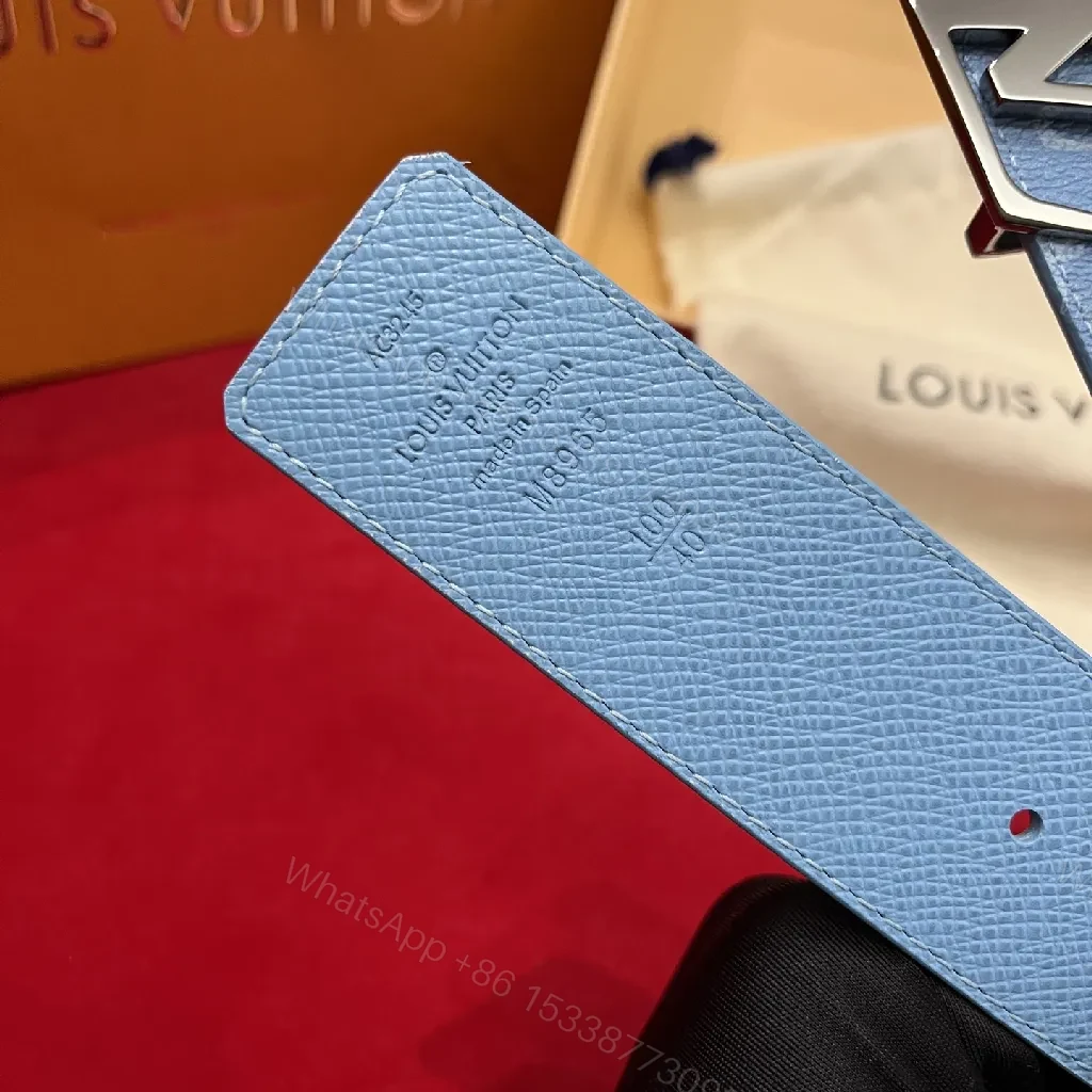 View 8 of Light-Blue Pebbled Leather Belt with Monogram Detail