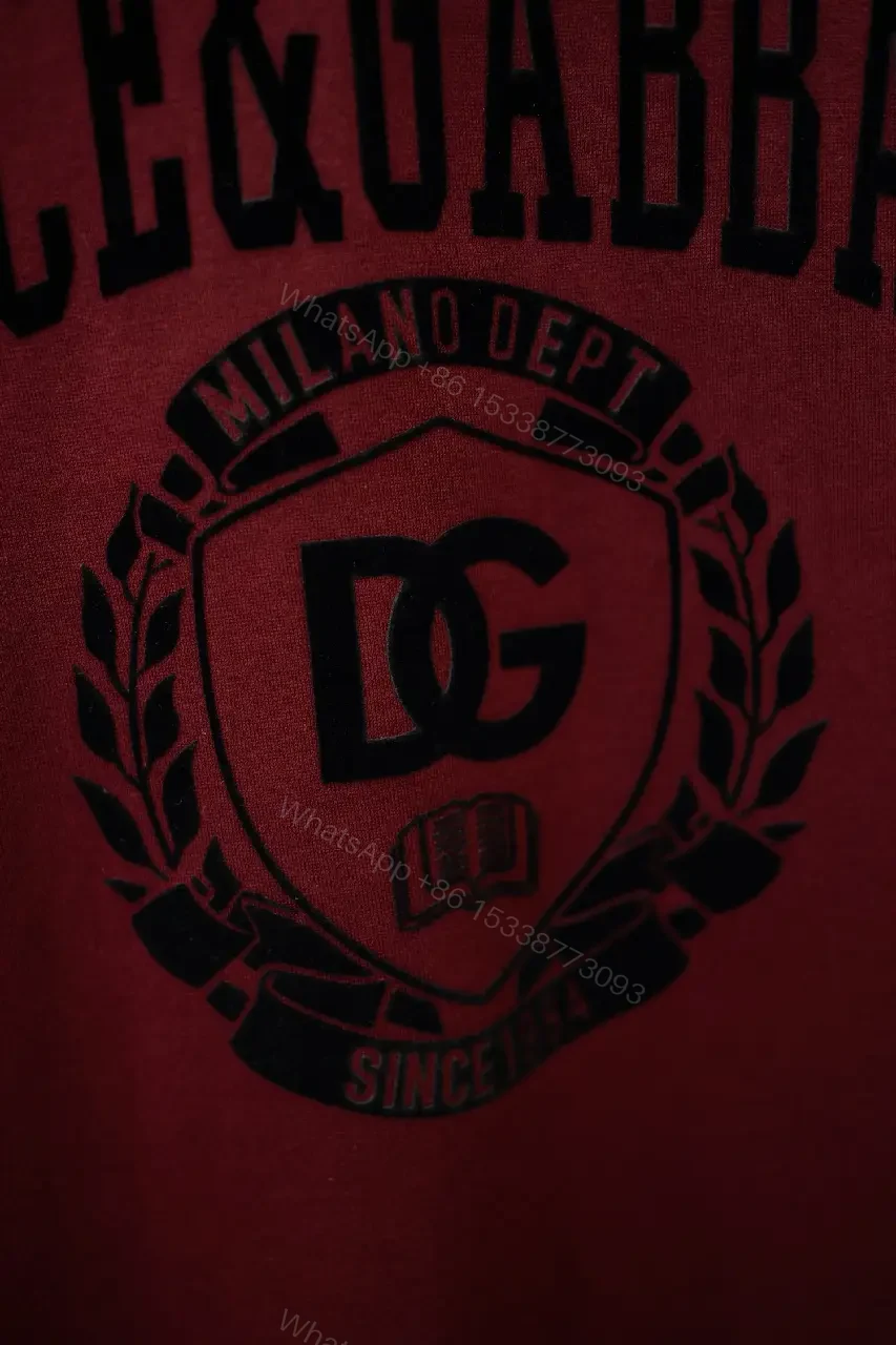 View 7 of Burgundy Short-Sleeve Crewneck T-Shirt with Black Logo Emblem