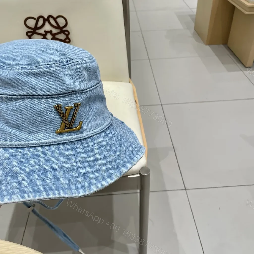 View 8 of Denim Bucket Hat + Gold Emblem + Casual Luxe + Iconic Accent + Hat