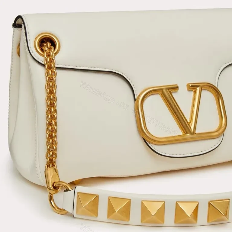 View 2 of Chic White Rockstud Shoulder Bag â€“ Everyday Luxury