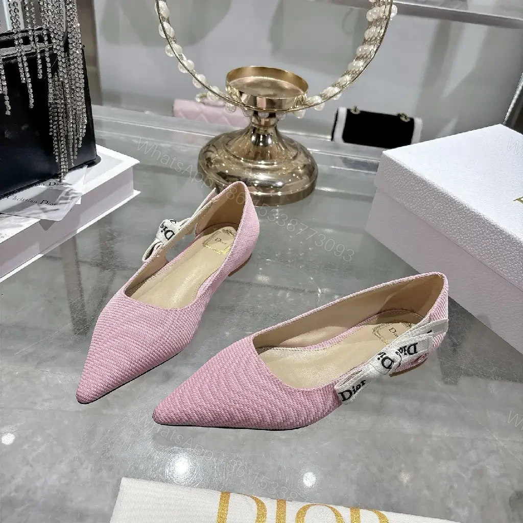 View 8 of Soft Pink Textured Slingback Heels with Logo Strap – Modern Luxe Pumps