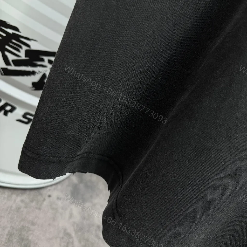 View 2 of Bold Graphic Crewneck Tee: Modern Streetwear Essential with Cross Feature