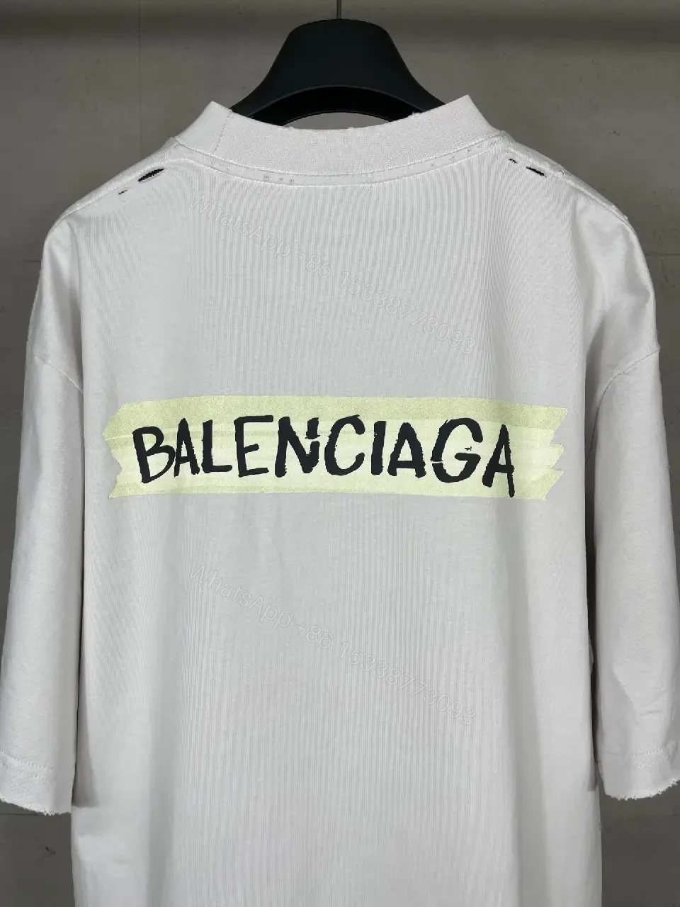 View 7 of Oversized White Tee with Signature Patch - Minimalist Luxe