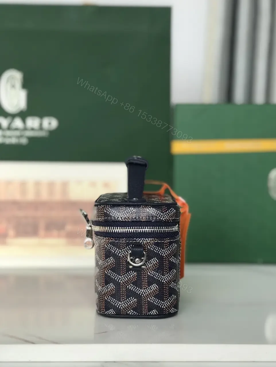 View 6 of Colorful coated-canvas pouch with distinctive pattern, compact design, durable, luxury vibe