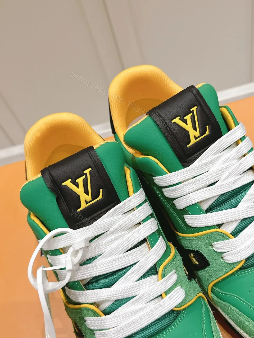 View 3 of Green Lux Leather High-Top Sneaker with LV Accents