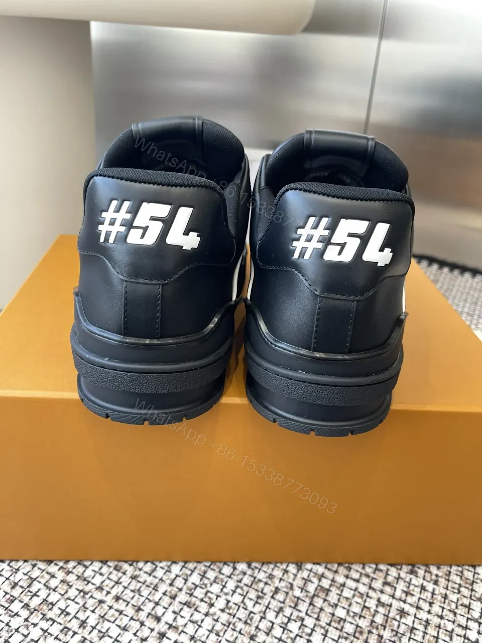 View 8 of Bold Monogram-Accent High-Tops with LV Detailing Sneakers