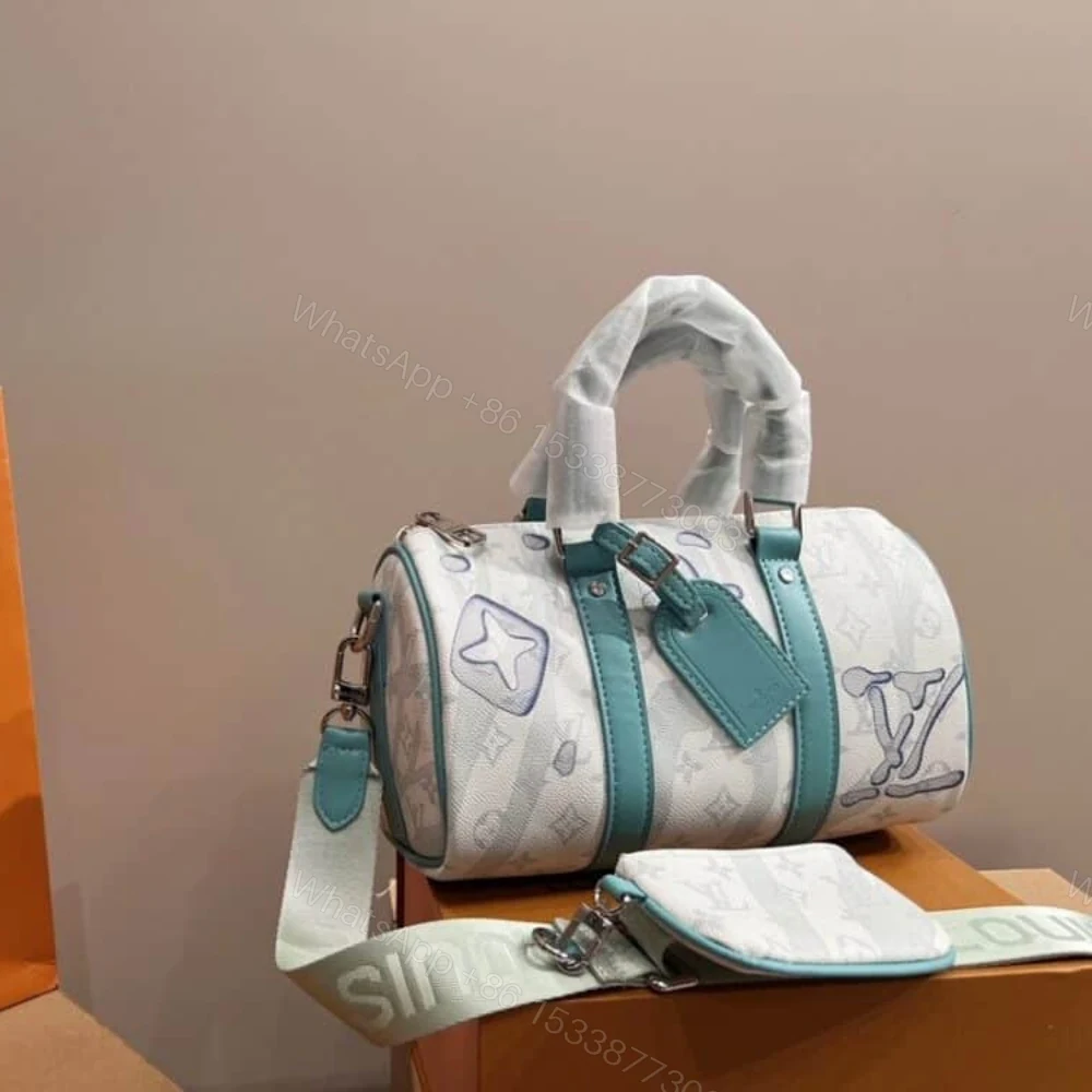 View 2 of Louis Vuitton Keepall Bandouliere Crystal Green 25Cm M22527