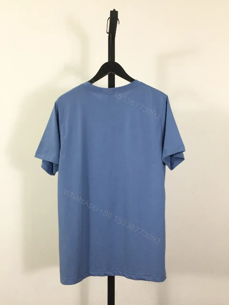 View 7 of Cozy Blue Luxe Tee: Lightweight Cotton-Blend, Subtle Logo, Modern-Casual
