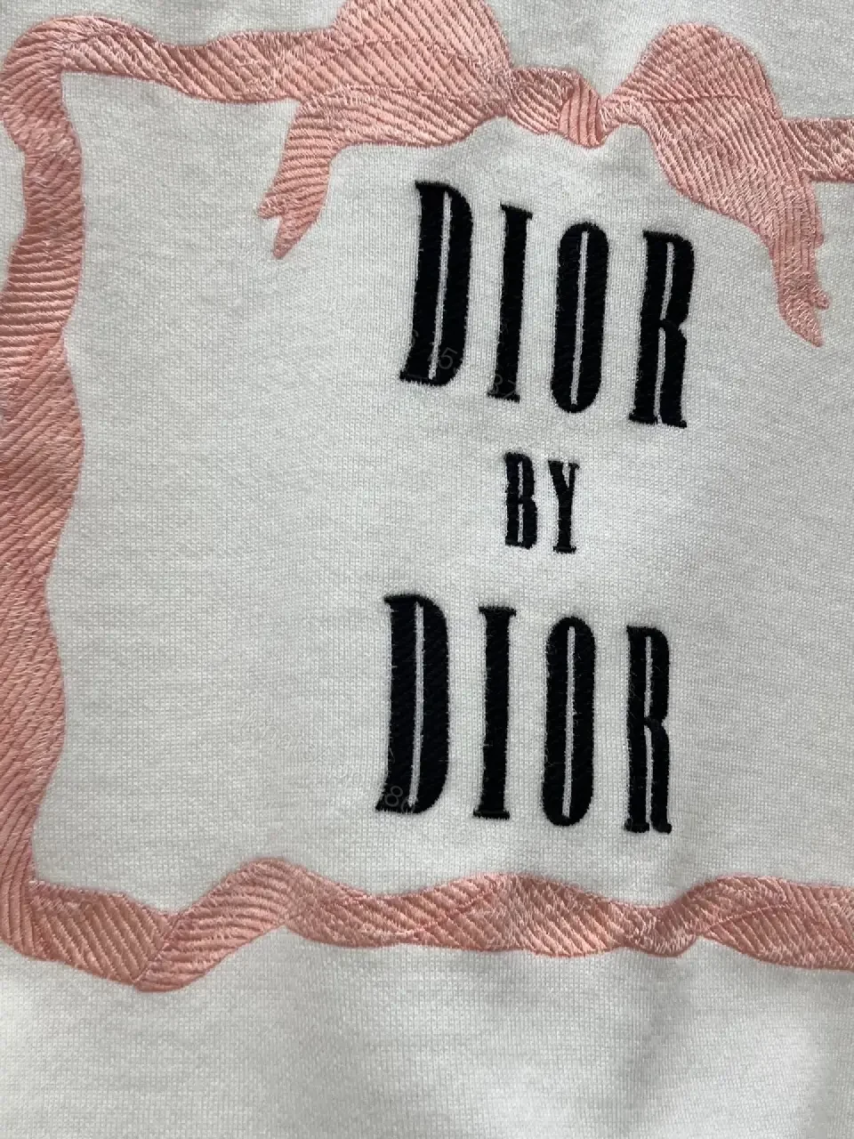 View 3 of cream cotton knit sweater with pink framed monogram print luxury casualwear