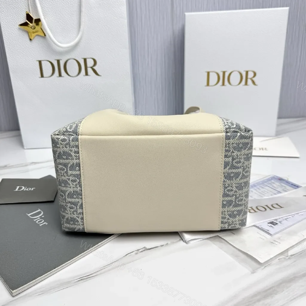 View 9 of Cream Leather & Denim-Inspired Bucket Bag, Structured Luxury