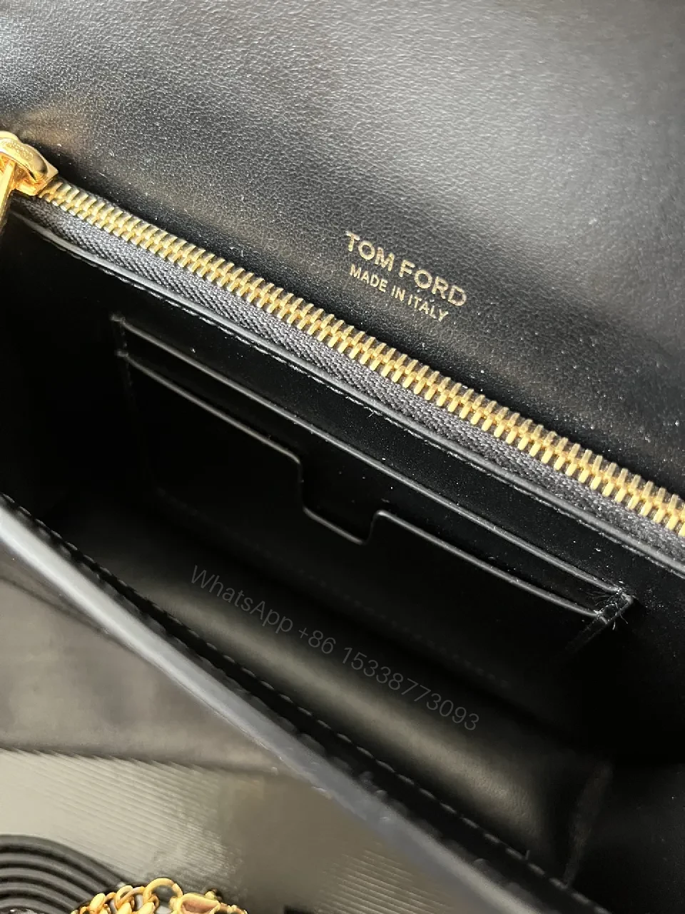 View 3 of Compact Black Leather Crossbody with Gold TF Emblem