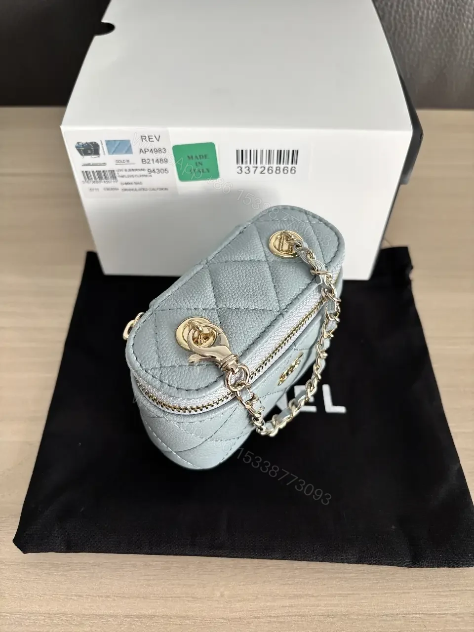 View 4 of Blue-Gray Quilted Leather Shoulder Bag with Chain Strap, Compact Luxury