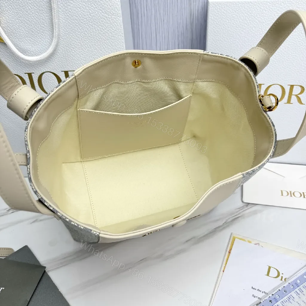 View 7 of Cream Leather & Denim-Inspired Bucket Bag, Structured Luxury