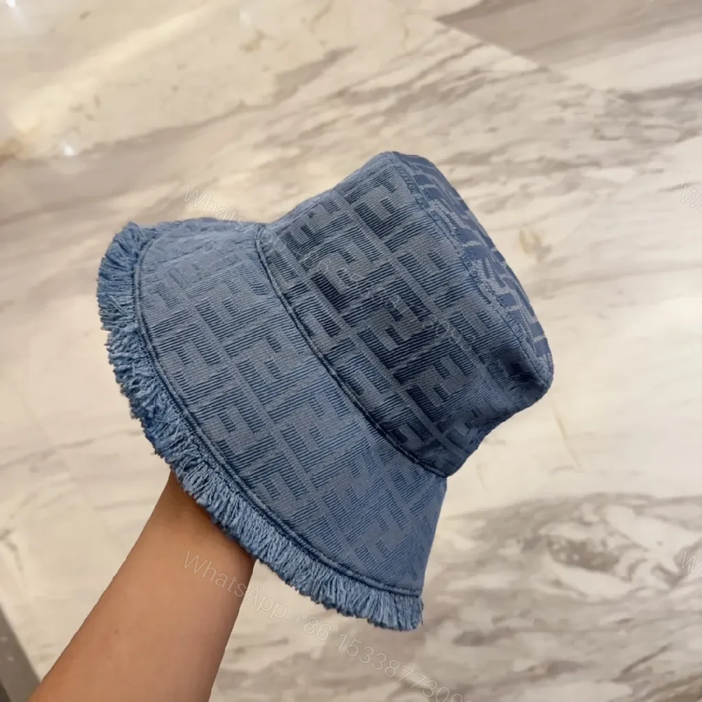 View 2 of Denim Monogram Fringe Bucket Hat – Luxe, Everyday Shade