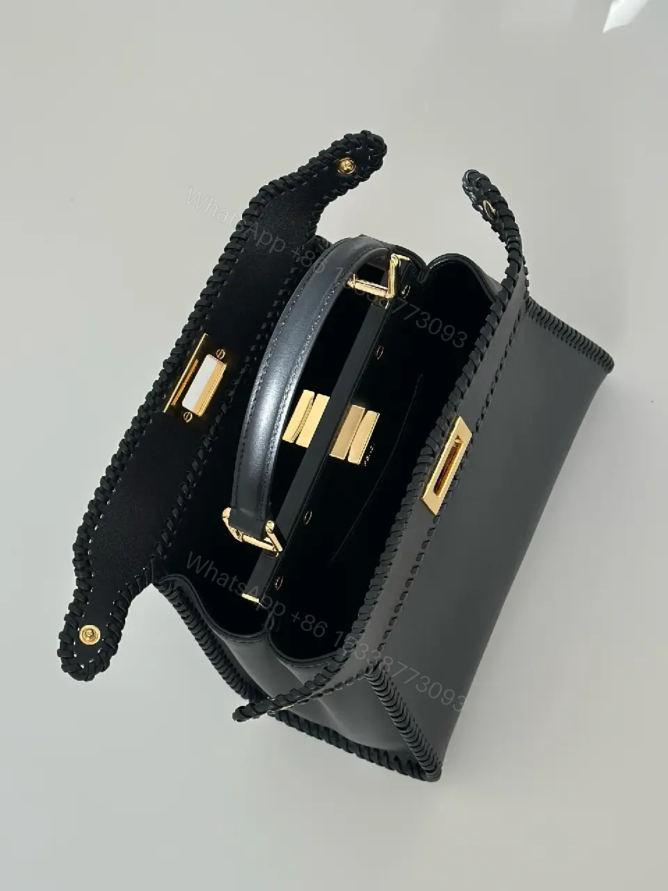 View 10 of Chic Black Leather Satchel: Structured, Versatile Luxury Bag