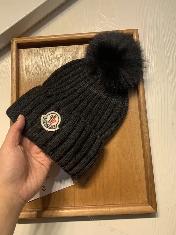 View 3 of Moncler Wool-Blend Beanie with Faux-Fur Pom, Black, Luxury Style