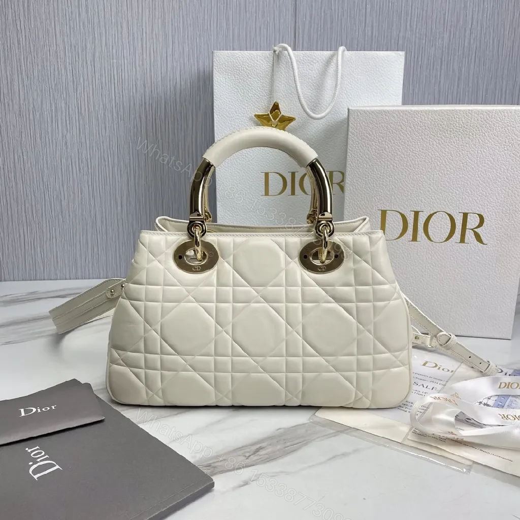 View 6 of Ivory Faux Leather Quilted Satchel with Signature Charms