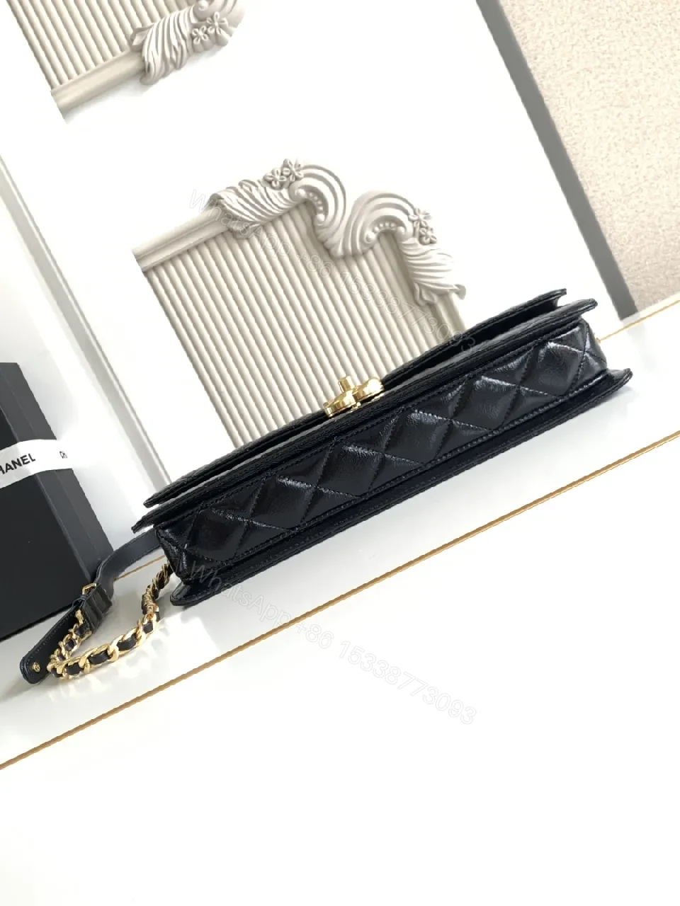 View 2 of Quilted Black Bag with Gold Hardware, Compact Shoulder Style