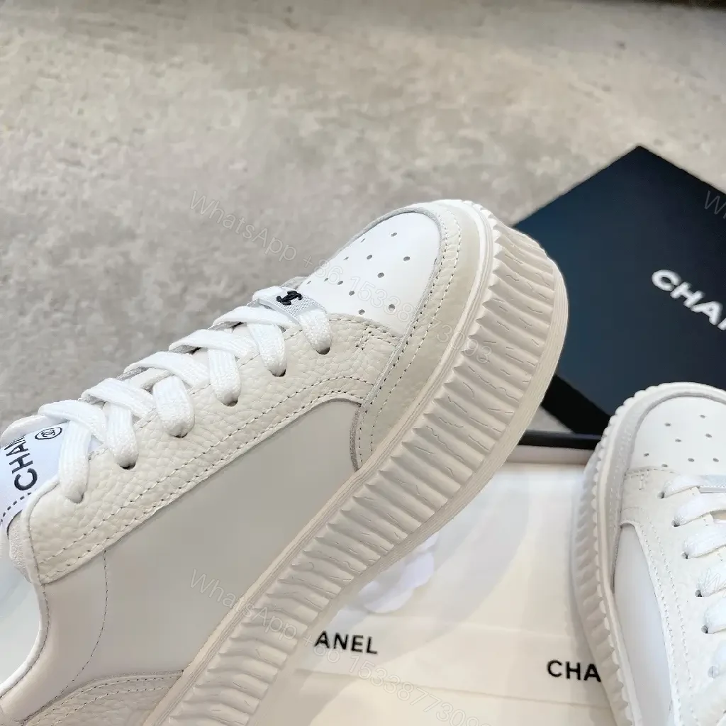View 2 of Minimalist White Platform Sneakers with Subtle Accents