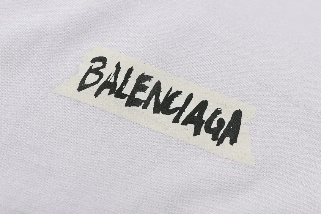 View 3 of Minimal White Cotton Tee: Subtle Logo, All-Day Comfort