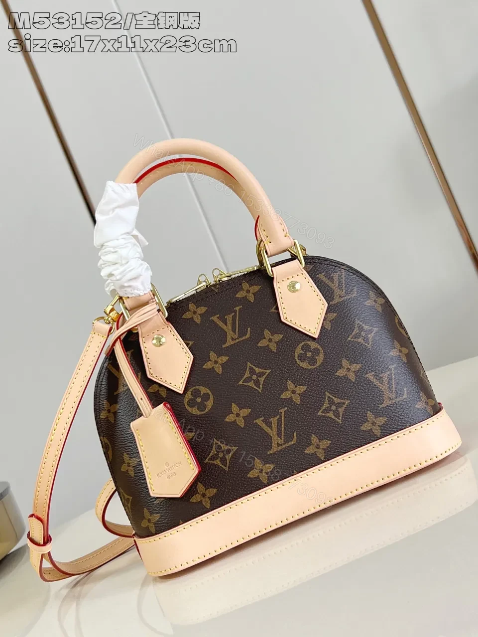 View 3 of Apricot Trim Monogram Satchel: Structured Luxury Bag
