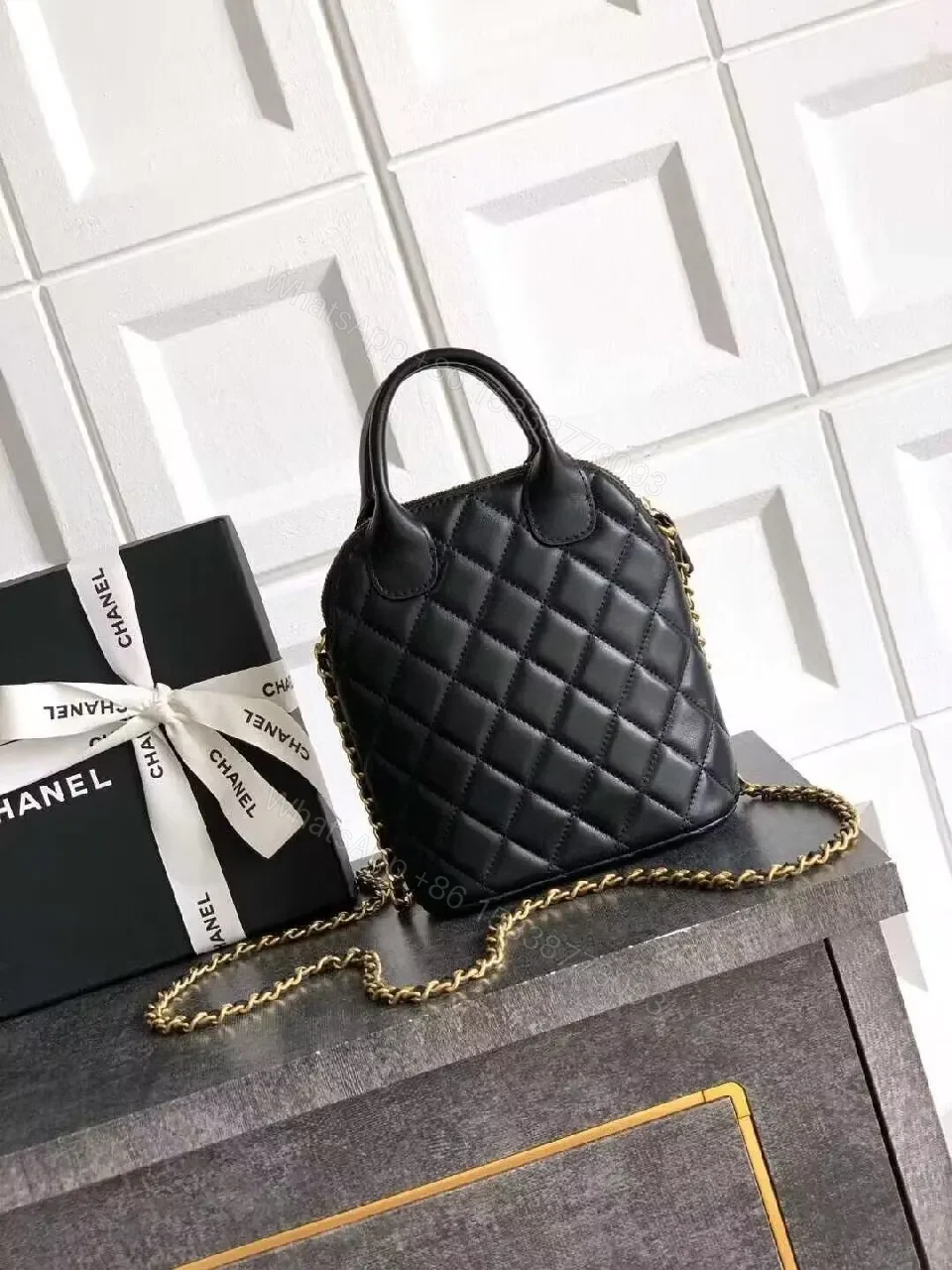 View 2 of Quilted Mini Bag with Suede Panel: Chic, Compact Luxury