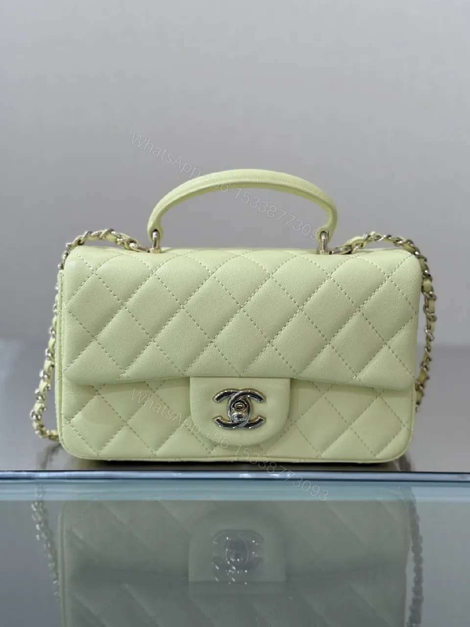 Pale Leather Quilted Mini Bag with Chain Detail — view 1