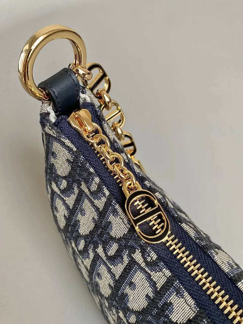 View 4 of Compact Monogram Bag: Gold Chain Accent, Leather Trim, Luxurious Compact Shoulder Bag
