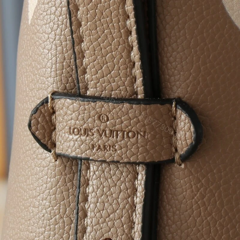 View 7 of Louis Vuitton Carryall PM Bicolor Monogram Empreinte Dove And Cream 29Cm M47180