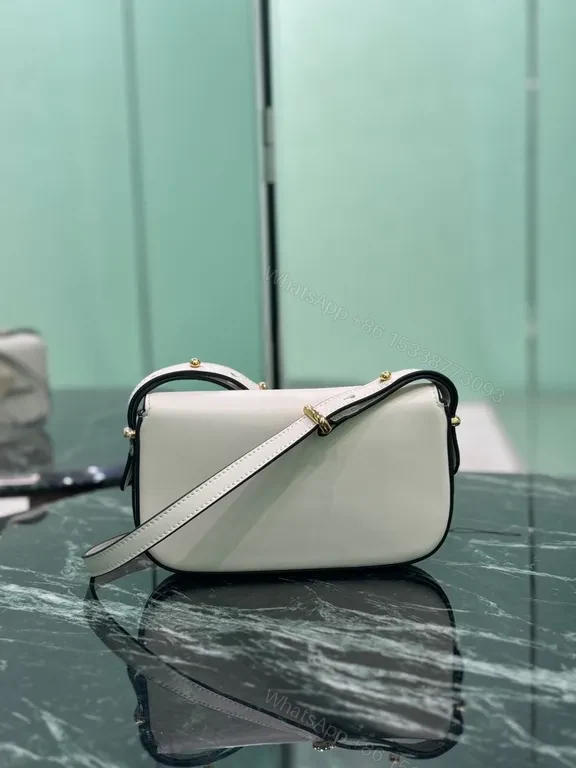 View 7 of Elegant Leather Crossbody Bag: Prada Triangle, Structured Luxury