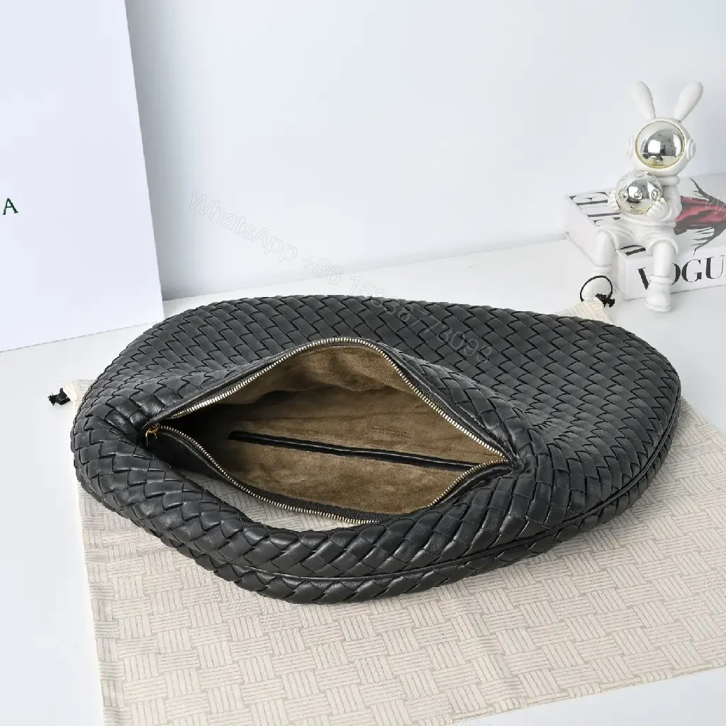 View 10 of Basketweave Handbag in Black – Premium Vegan Leather, Curved Handle, Compact Luxury Bag