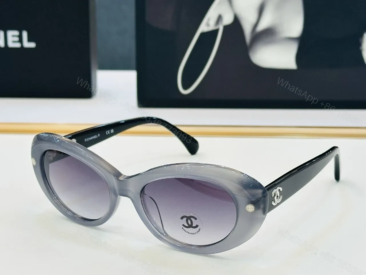 View 3 of Chic Black Cat-Eye Sunglasses with Gold Detailing