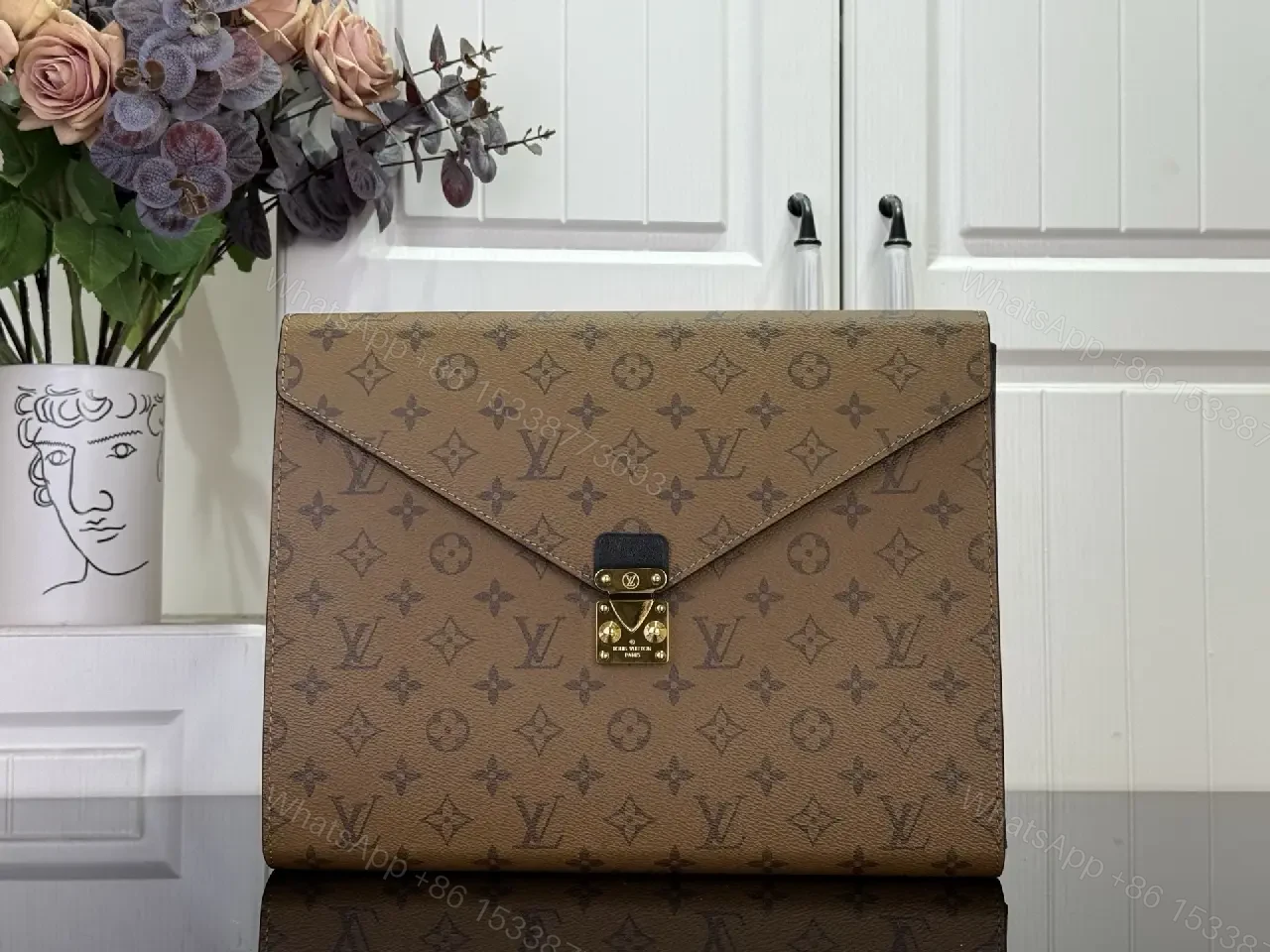 Classic Monogram Clutch: Coated Canvas, Gold Lock, Envelope — view 1