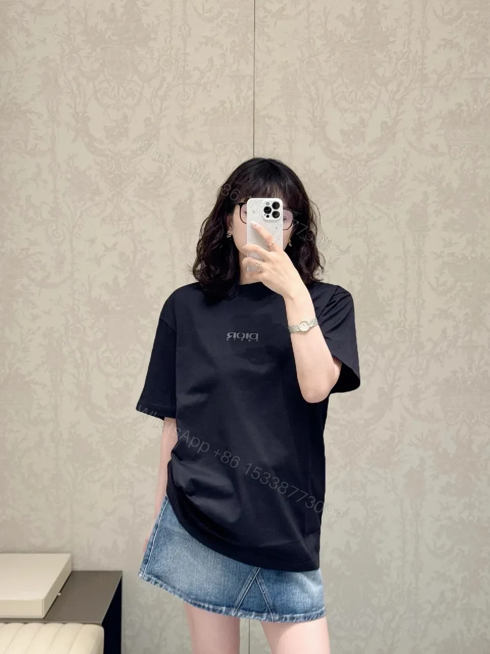 View 2 of Minimalist Black Tee Dress: Subtle Dior Branding, Versatile Style