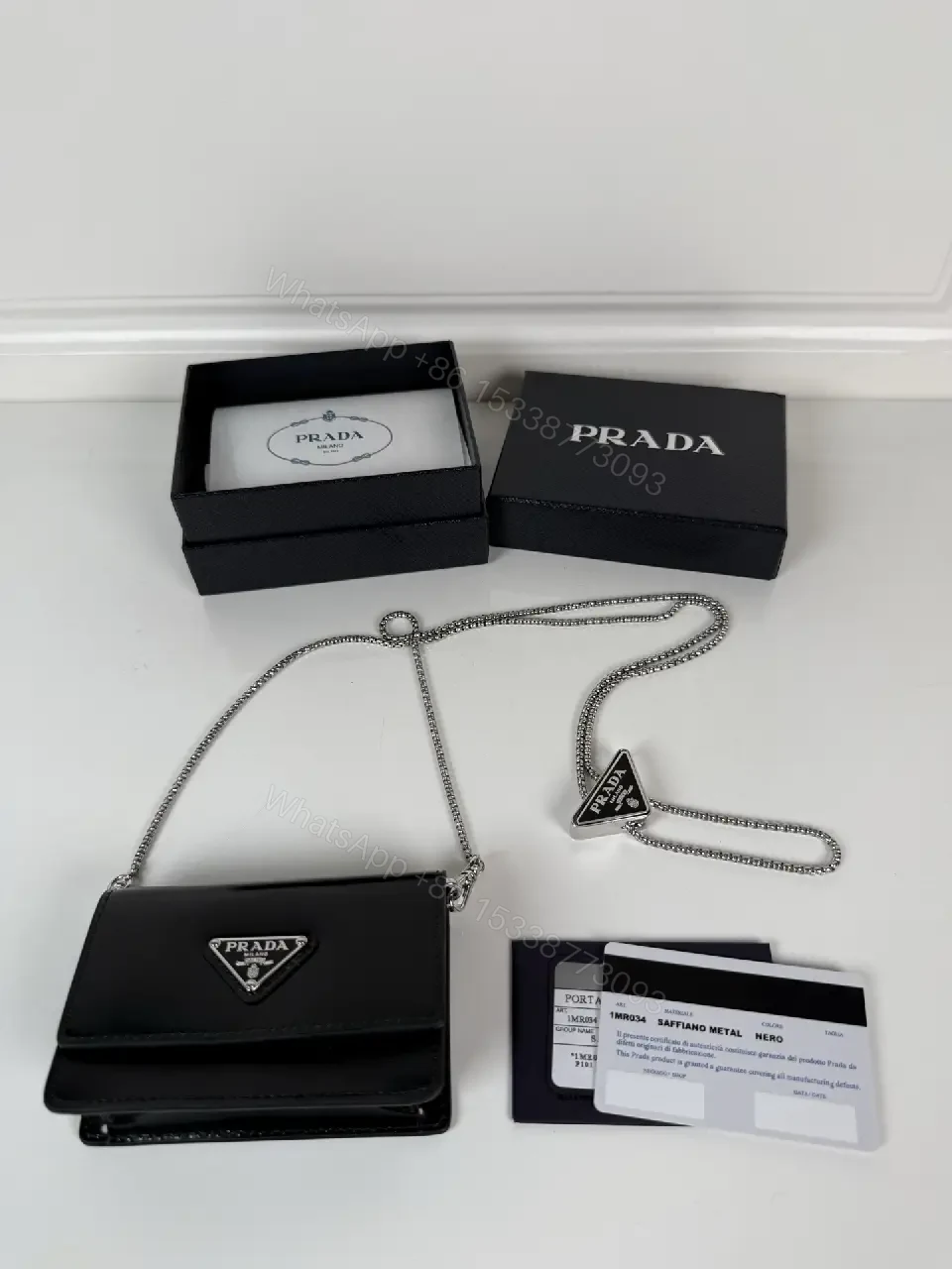 View 9 of Chic Black Leather Mini Bag with Signature Logo Chain
