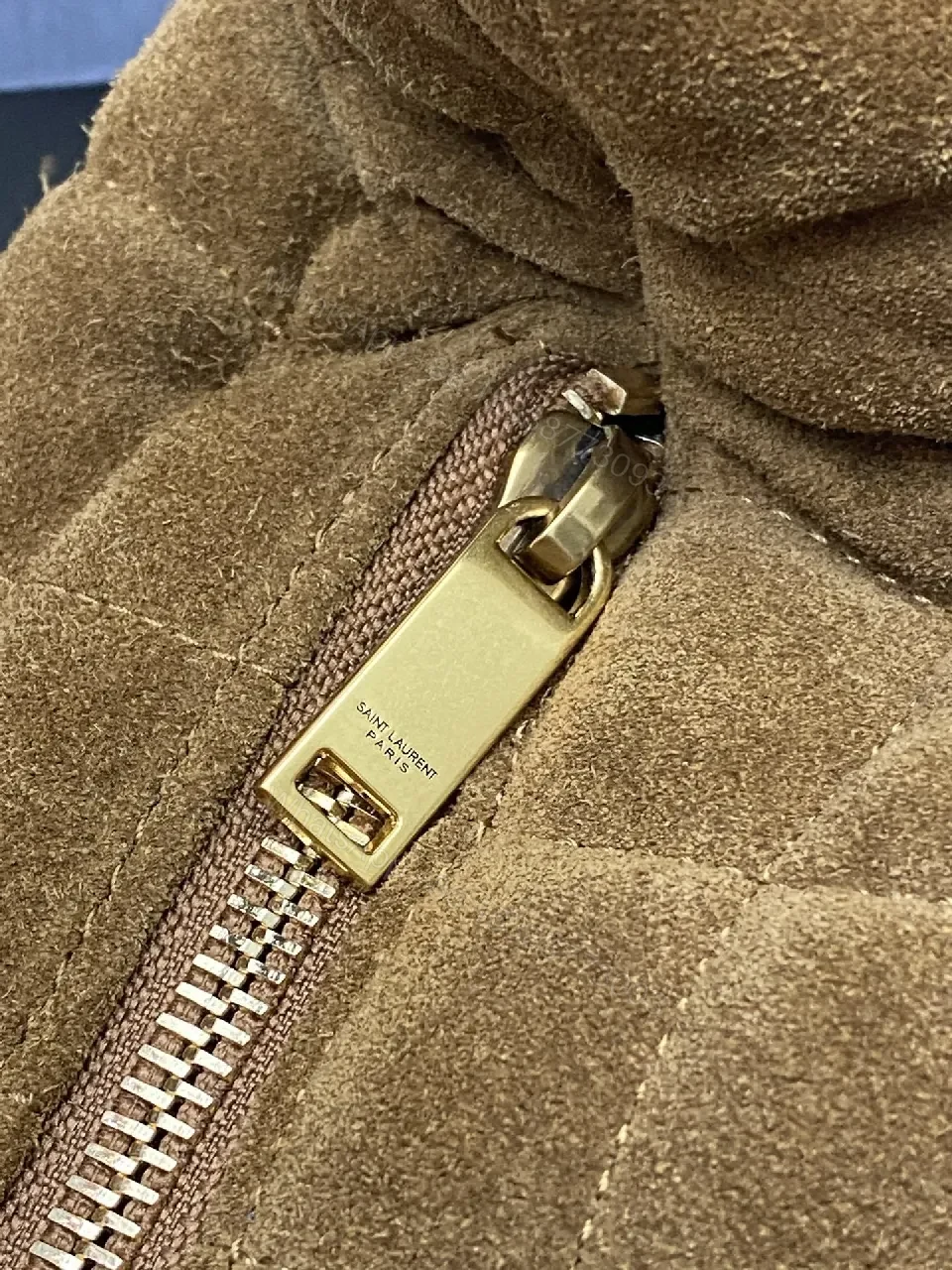 View 4 of Taupe Quilted Circle Bag - Luxury Style, Plush Top-Handle, Iconic Hardware