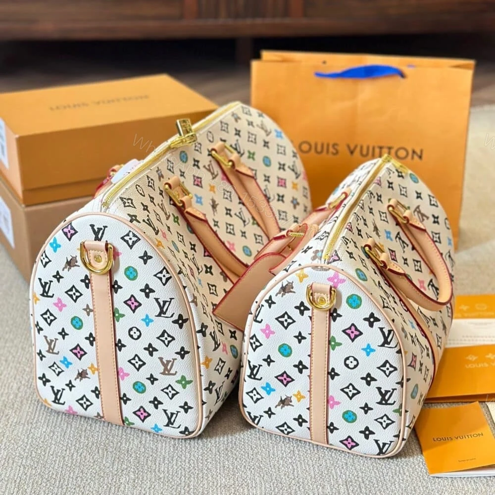 View 5 of Louis Vuitton Keepall Bandoulière Vanilla 40Cm M25233