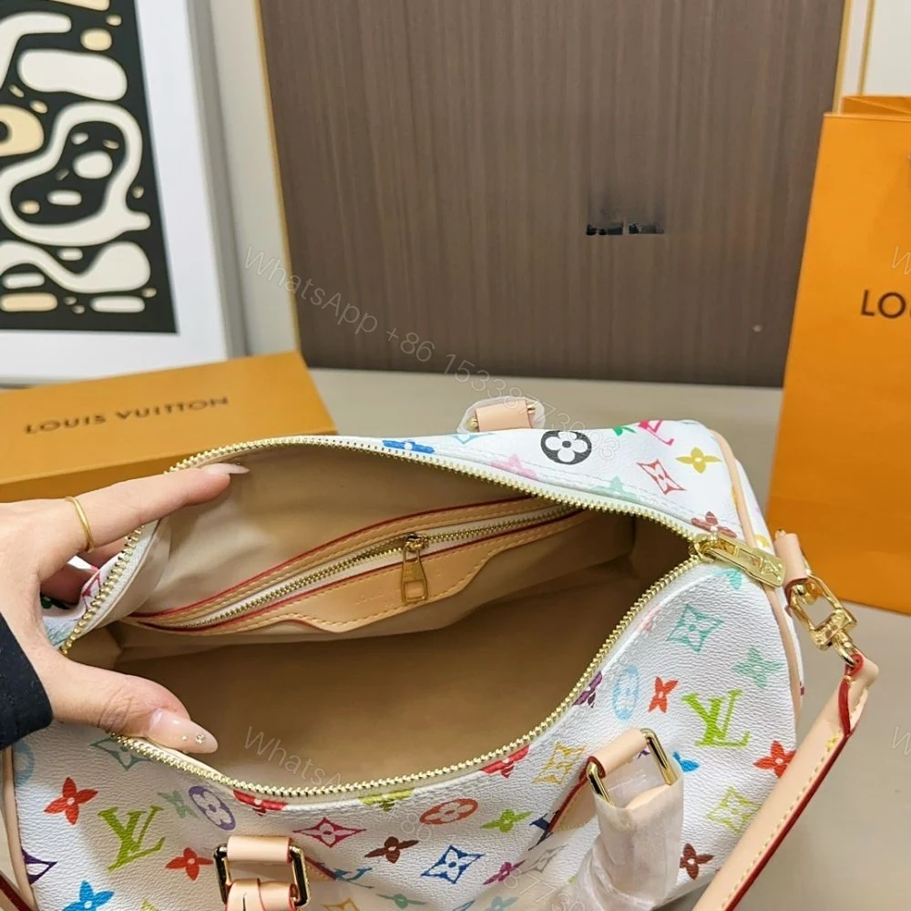 View 5 of Louis Vuitton TM Speedy Soft 30 Multicolor White 30Cm M27789