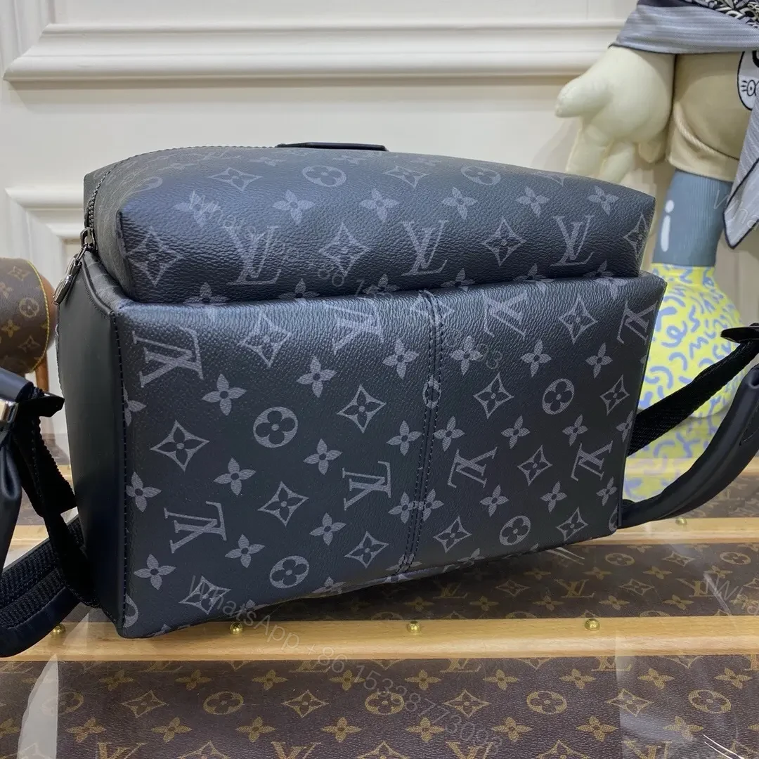 View 4 of Louis Vuitton Discovery Backpack in Monogram Eclipse canvas