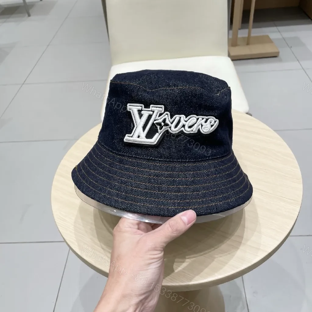View 4 of Denim Bucket Hat + Embroidered Logo + Streetwear Chic + Luxury Detail + Hat