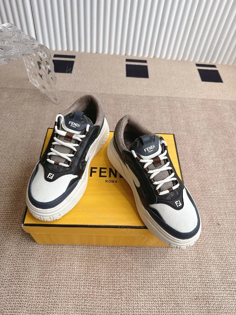 Bold Black-White Luxe Sneakers with Signature Detailing — view 1