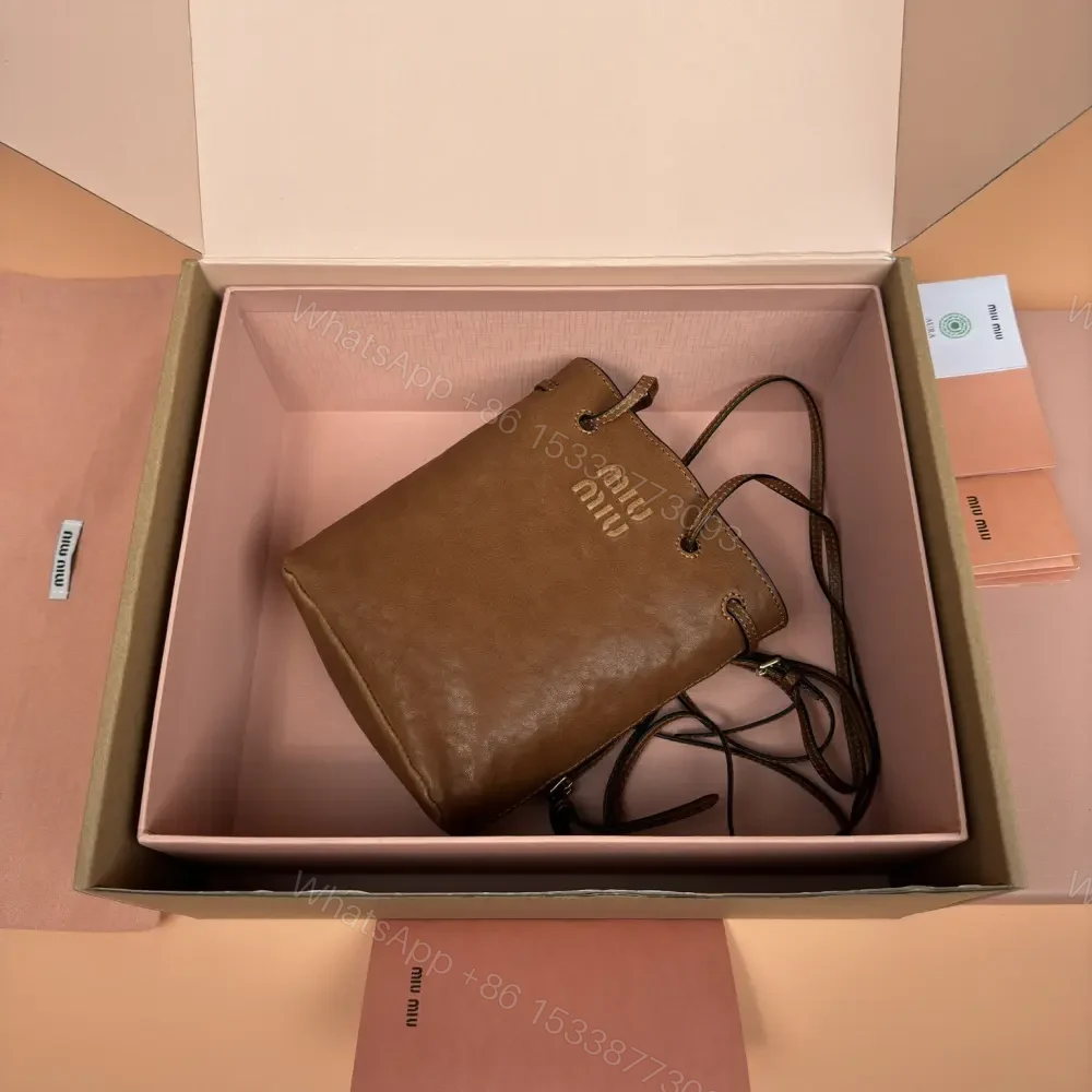 View 8 of 高仿miumiu*5NR460小羊皮水桶包棕色免檢版
