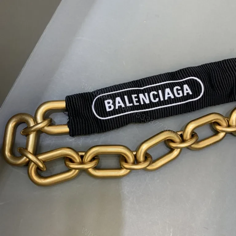 View 5 of Chic Black Leather Crossbody with Bold Gold Hardware Bag